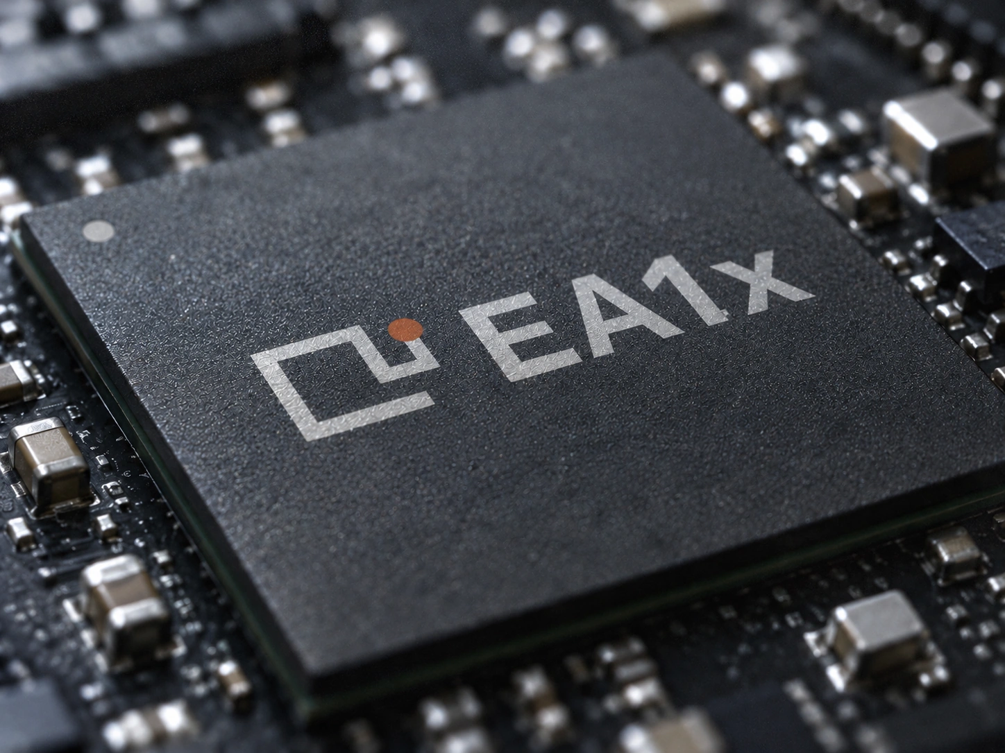 Conceptual EA1x edge AI chip on a dark circuit board, with a custom orange-accented symbol